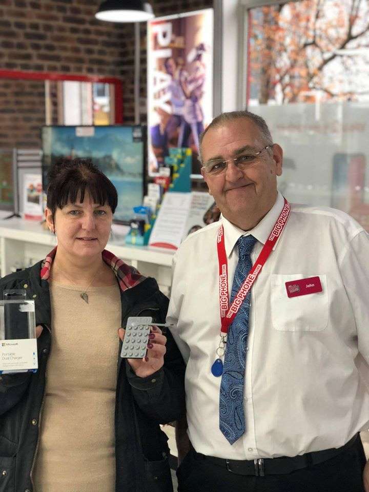 A customer being helped by a member of staff at The Big Phone Store