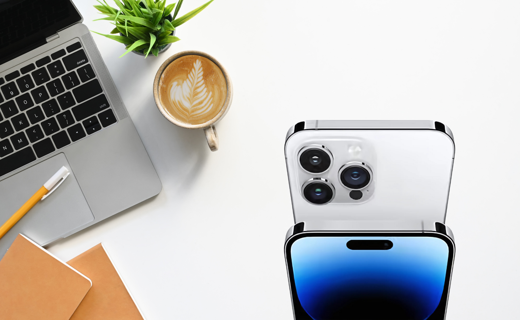Iphone 14 pro in silver with minimalist white desk background