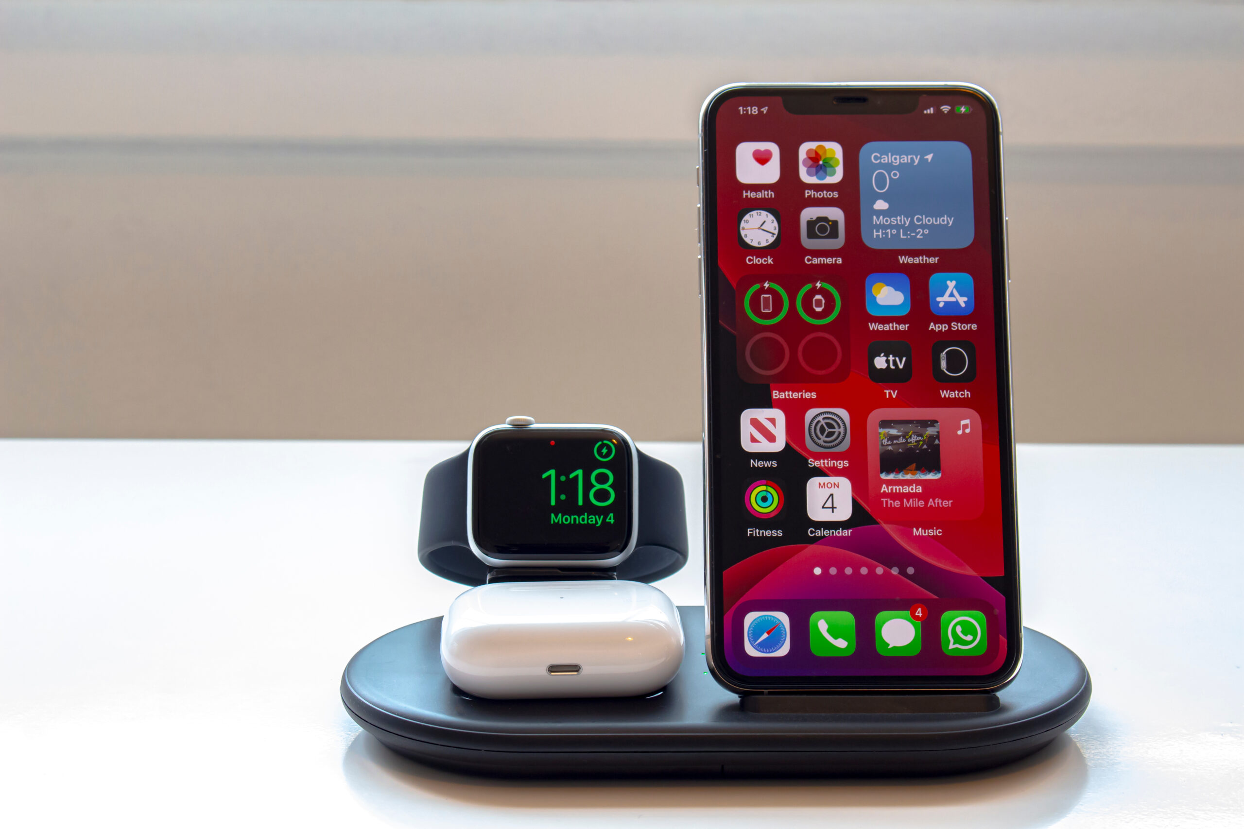 Charging station with phone, apple smartwatch and airpods case