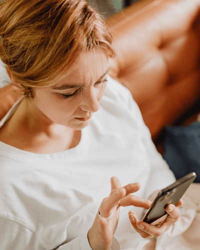 Women browsing through refurbished phone
