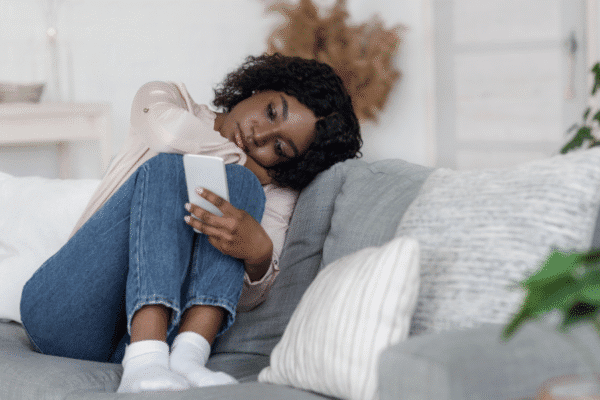 Blue monday: woman low mood on phone