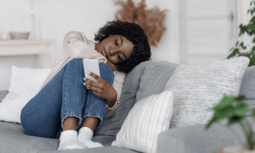 Blue monday: woman low mood on phone